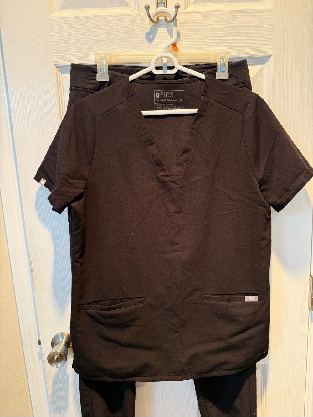Figs Women’s Black V-Neck Short Sleeve Scrub Top and joggers pants